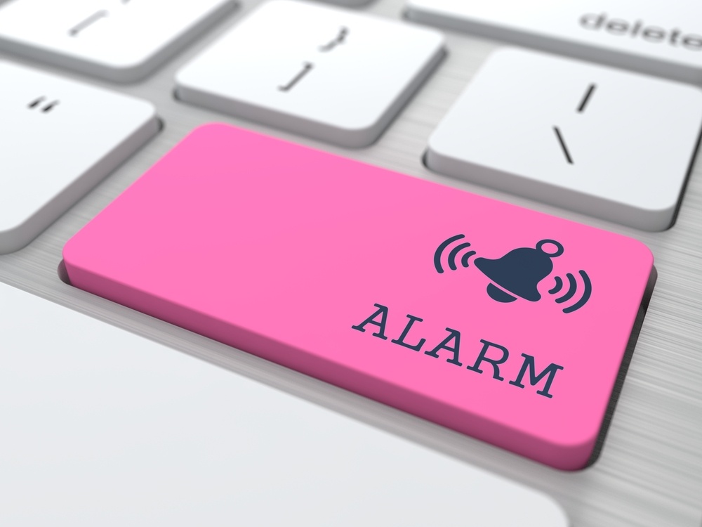 Eine Taste auf der Tastatur, auf der "Alarm" steht.