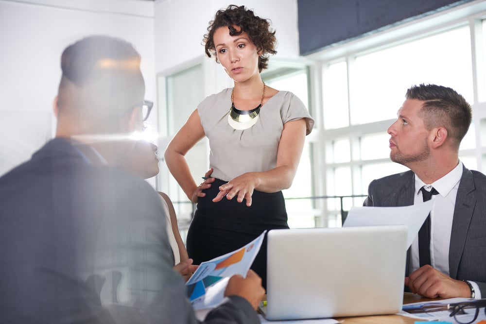 Business meeting in office with three colleagues